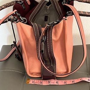 Melon color with ostrich handles